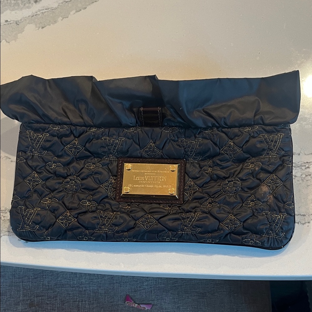 Louis Vuitton Quilted Black Clutch with Gold Plate